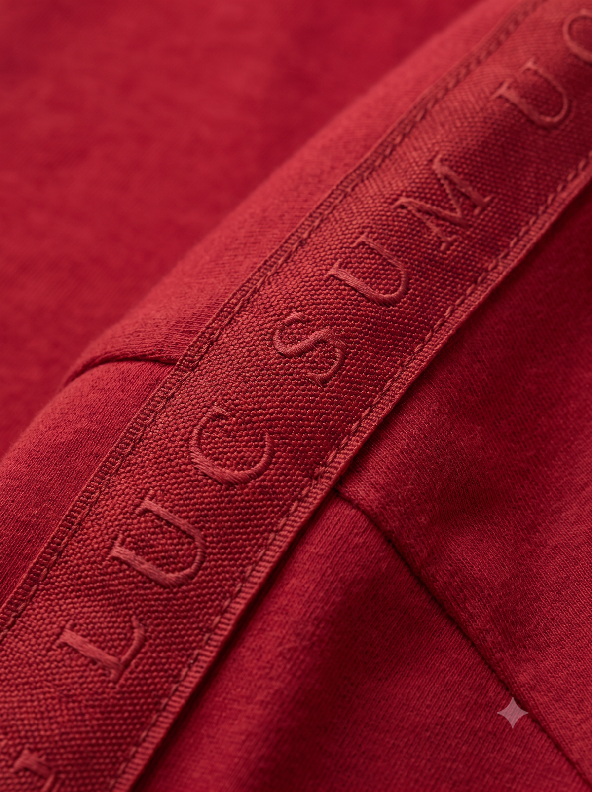 Lucsum Branded Tape Red — Macro close-up