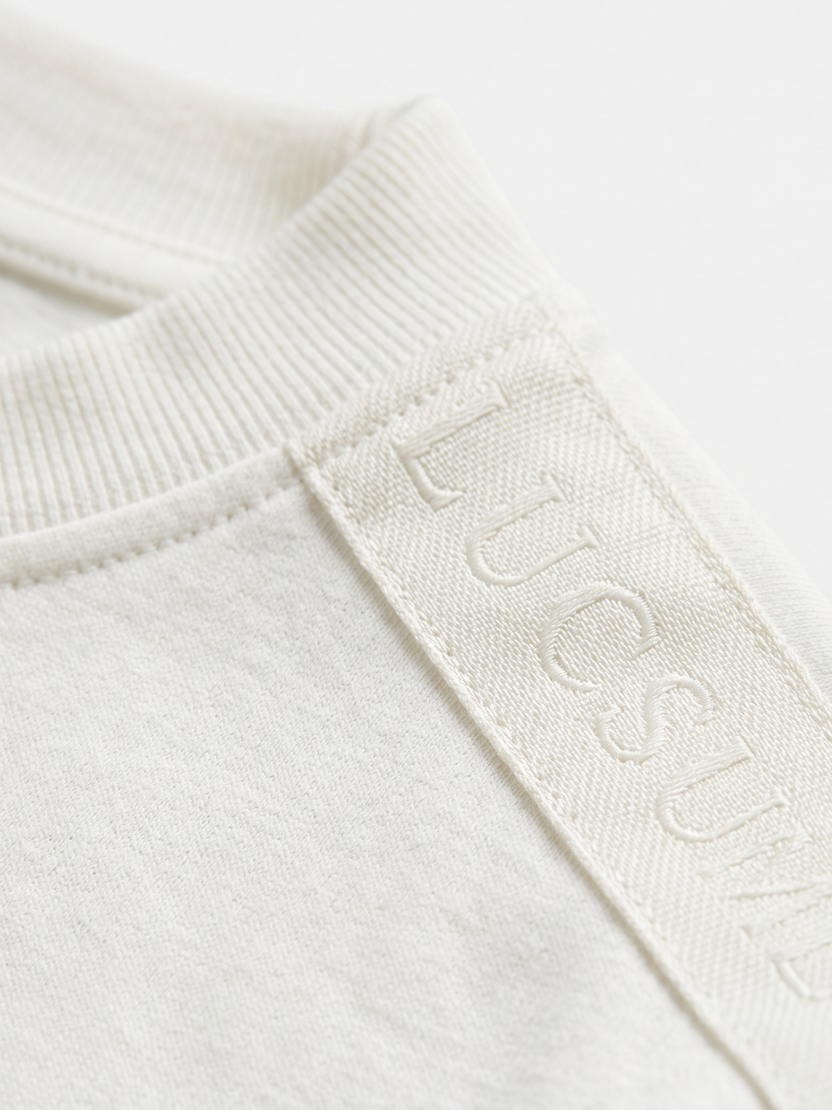 Lucsum Branded Tape White — Macro close-up