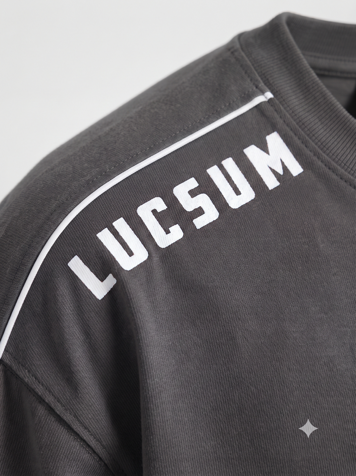 Lucsum Shoulder Logo Charcoal oversized tee, macro fabric and shoulder logo detail