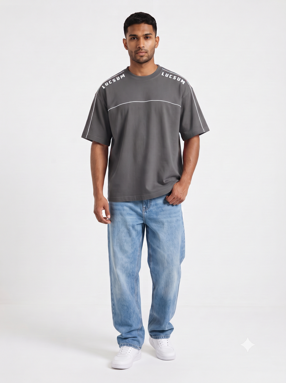 Model wearing the Lucsum Shoulder Logo Charcoal oversized tee